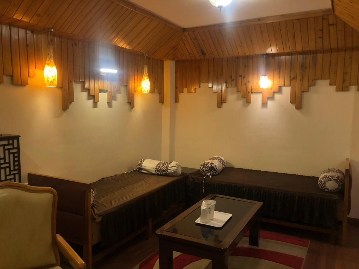 Omega Residency Inn